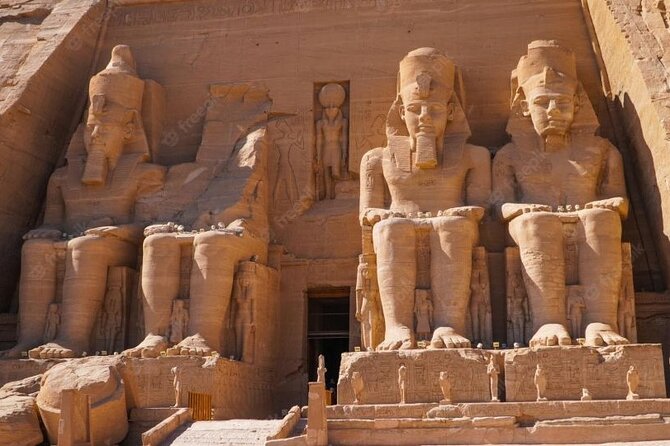 Abu Simbel Temple Day Trip with Hotel Pickup From Aswan - Seeing the four statues at the Great Temple