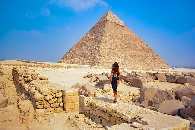 All Inclusive Private Trip to Giza Pyramids,sphinx , Camel ride - Standing before the Great Pyramid of Khufu
