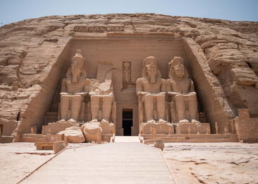 Aswan: Abu Simbel Group Tour with Guide and Entrance Fees - The long road through the desert