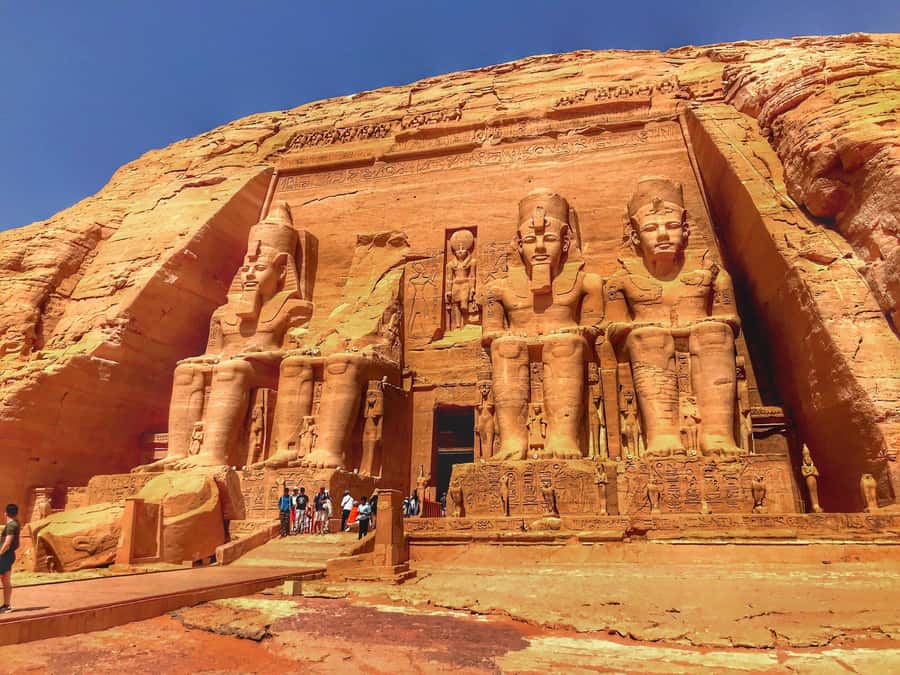 Aswan: Abu Simbel Group Tour with Guide and Entrance Fees - Seeing the smaller Temple of Hathor