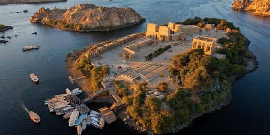 Aswan: High Dam, Unfinished Obelisk, Philae & Nubian Village - Reaching Philae Temple by motorboat
