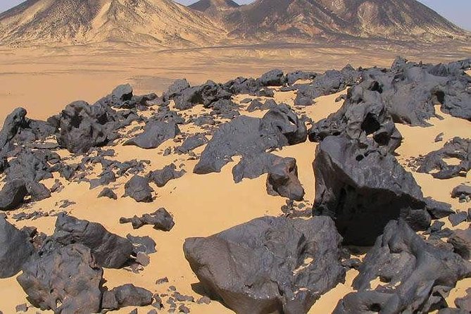 Black and White Desert and Bahariya Oasis Tour 2 Days 1 Night - The Black Desert gives the trip a darker opening