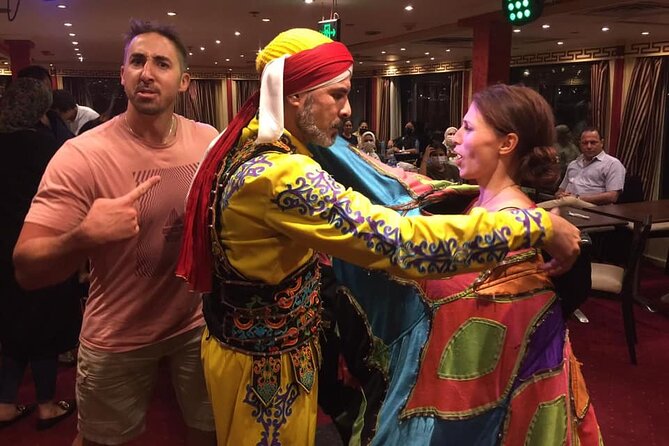 Cairo Dinner Cruise in Nile River With Belly Dancer & Tanora show - Belly dancing, live music, and the Tanora show