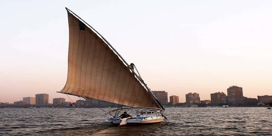 Cairo: Felucca ride on The Nile River with Meals - Eating an Egyptian meal on board