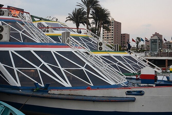 Cairo/Giza: Sunset Dinner Cruise on the Nile River Tour with Show - Cairo’s lights from the water