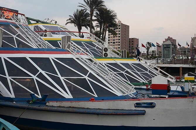 Cairo: Nile Dinner Cruise with Show & Shared Transfer - Boarding a converted Nile passenger ship