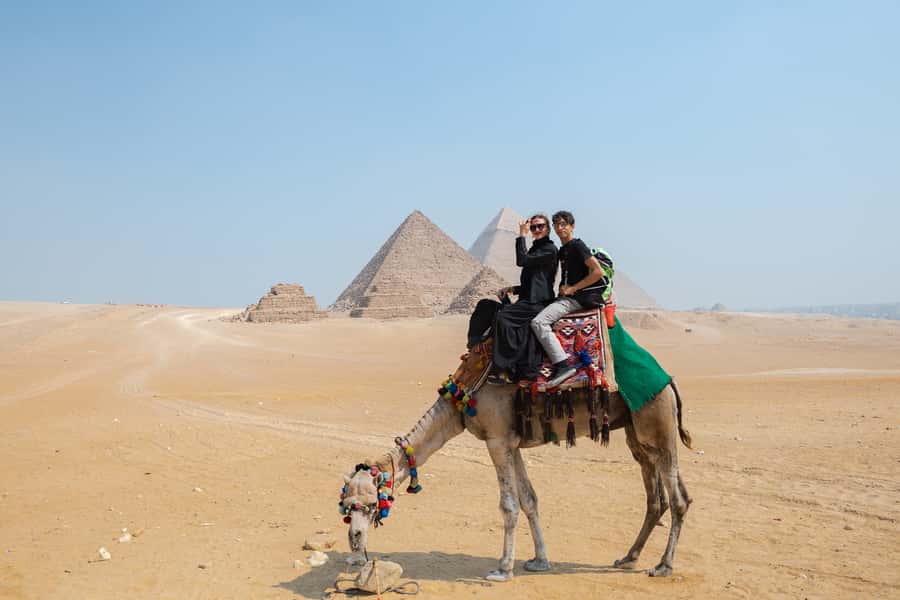 Cairo: Private Half-Day Pyramids Tour with Photographer - The camel ride and first views of the pyramids