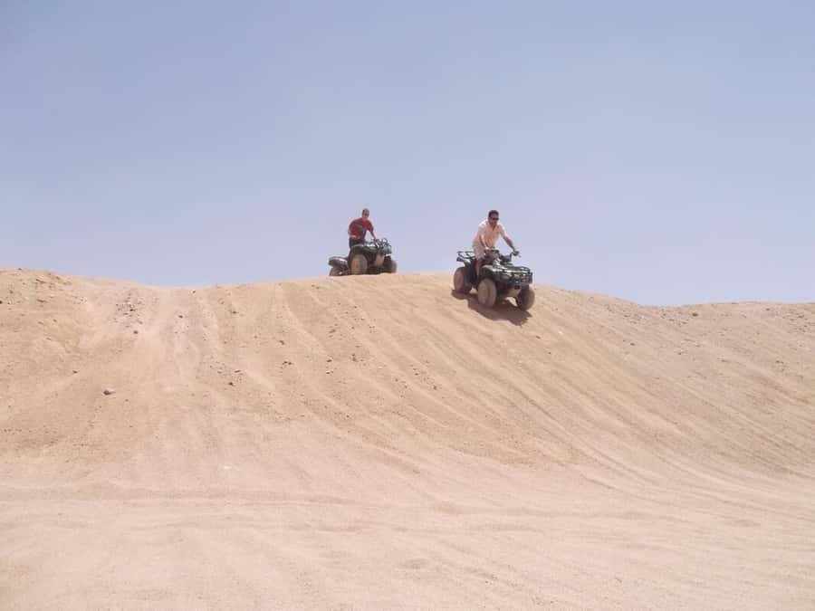 Desert Sunset Quad Bike ATV for 50Km, Oriental Show, Dinner, - A short camel ride and Bedouin camp stop