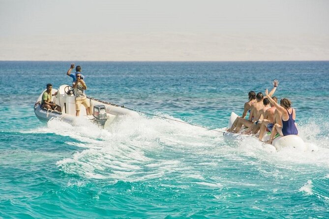 Dolphin House Snorkeling Sea Trip, Water Sport , Lunch - Hurghada - Getting comfortable aboard a group boat