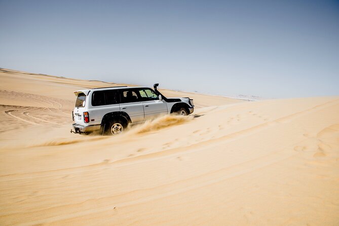 From Cairo 4x4 Safari, Camel Ride, Magic Lake, Waterfalls & Lunch - Wadi El Rayan’s dunes and the 4x4 ride