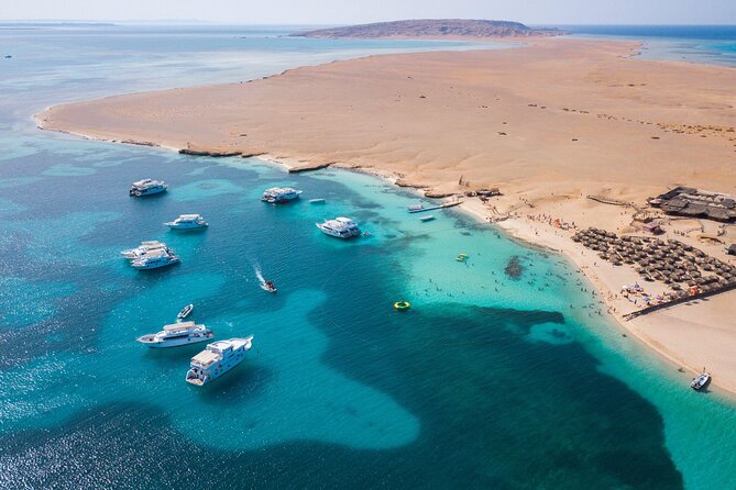 From Hurghada: Orange Bay Snorkeling Trip with Lunch - Egyptian buffet lunch on the boat