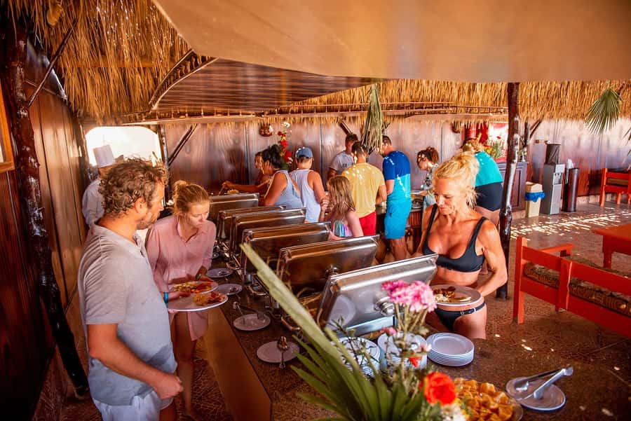 From Hurghada: Paradise Island Snorkeling Cruise with Lunch - The crew and the tone of the day