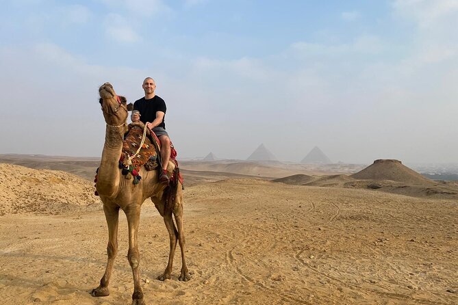 Full Day Tour to Giza Pyramids, Sphinx, Egyptian Museum, Khan el-Khalili Bazaar - Private transport, pickup, and the value of a guide