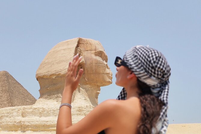 Giza pyramids all inclusive lunch, fees,camel&inside 3rd pyramid - The Sphinx adds a different kind of monument