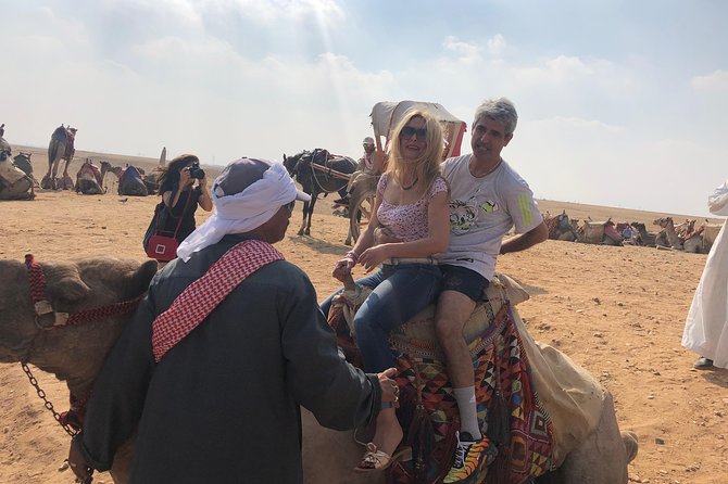 Half dayTour Pyramids of Giza Sphinx including Camel ride - The papyrus institute stop