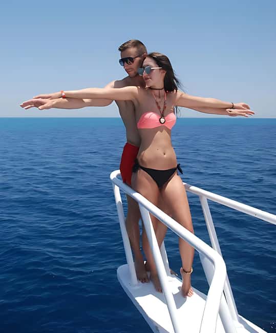 Hurghada: Dolphin Cruise with Snorkeling & Buffet Lunch - Two snorkeling stops over coral reefs