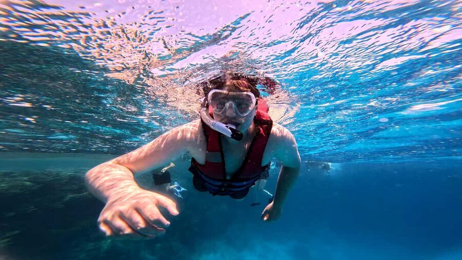 Hurghada: Dolphin Watching Boat Tour with Snorkeling & Lunch - Two snorkeling stops on Red Sea reefs