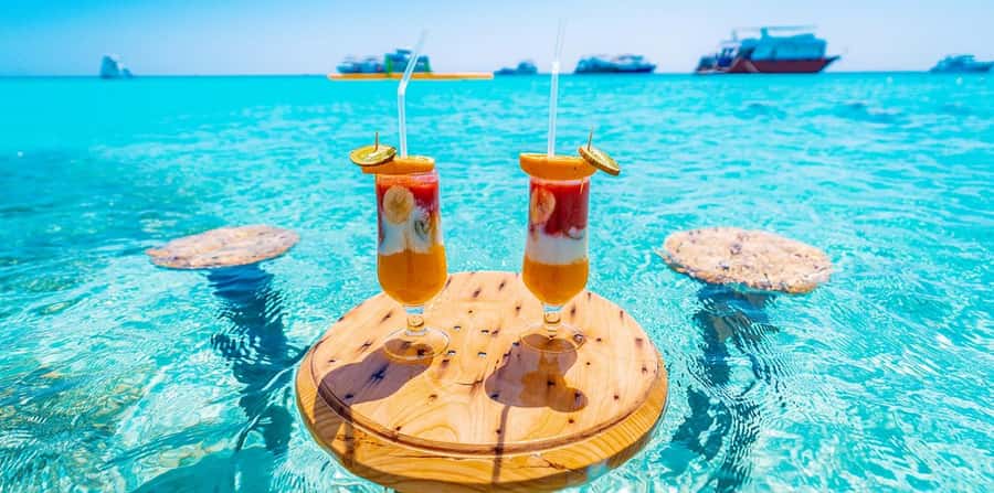 Hurghada: Hula Hula Island Boat Trip with Snorkeling & Lunch - Banana boats, sofa boats, and family fun