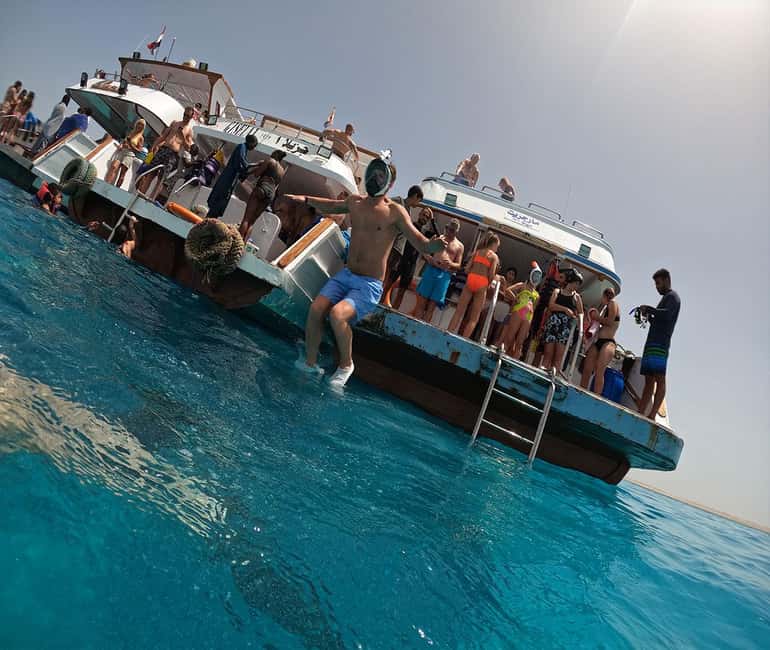Hurghada or Makadi: Discover the Magic of Dolphin House - Sofa boat fun and jumping from the deck