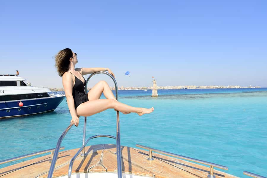 Hurghada: Orange Bay Island Boat Trip w/ Breakfast and Lunch - Banana boats, sofa rides, and the ride home