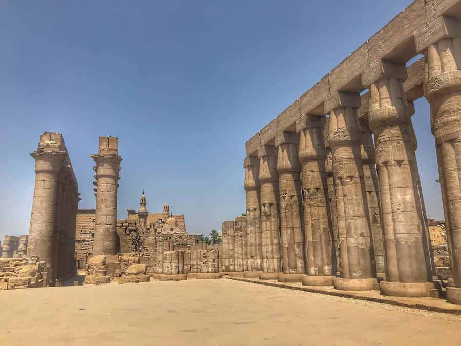 Luxor: Half-Day Tour to Karnak & Luxor Temples - Luxor Temple beside the modern city