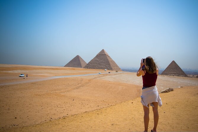 Private Day Tour of Giza Pyramids, Egyptian Museum, and Bazaar" - The Great Sphinx and its enormous stone face