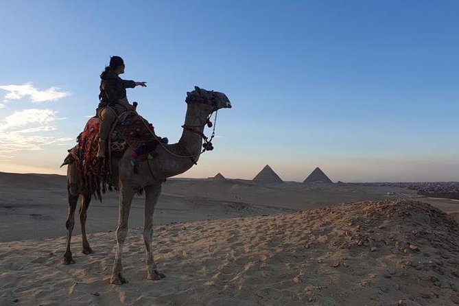 sunset at Giza pyramids by camels - A sunset camel ride with the pyramids in view