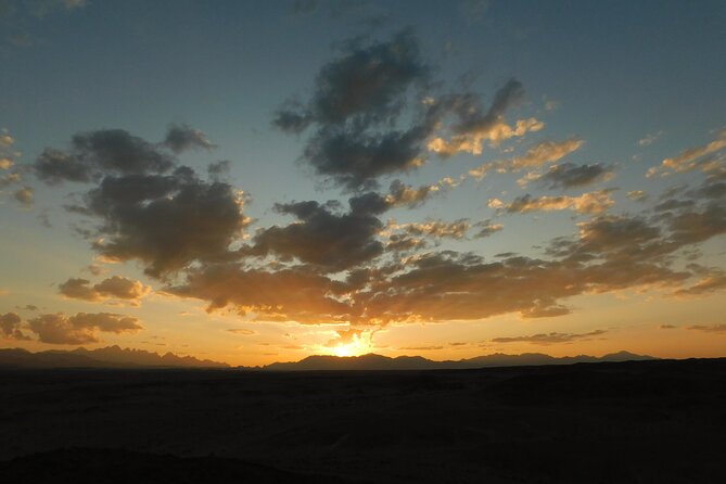 Sunset Safari trip by Jeep - Bedouin tea, bread, and a camel ride