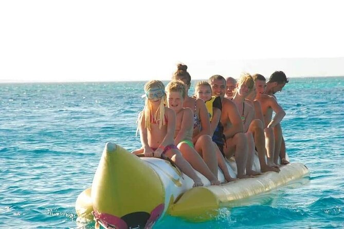 Swimming with Dolphins and Banana Boat Sea Trip Day Experience - Hurghada - Two reef stops with coral and fish