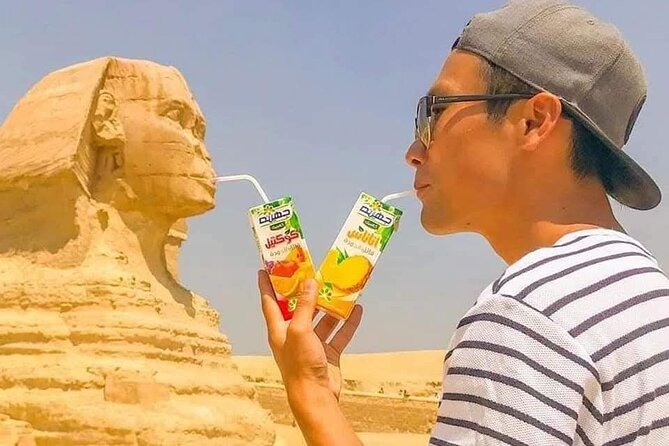 The Giza Pyramids, the Great Sphinx, and Local Lunch. - Reaching the plateau in an air-conditioned vehicle