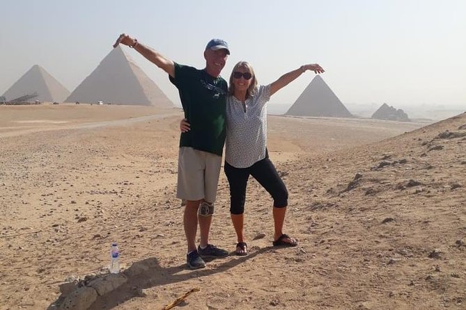 Top rated Giza Pyramids and Sphinx Tour from Cairo Airport - The camel ride: fun, but keep expectations sensible